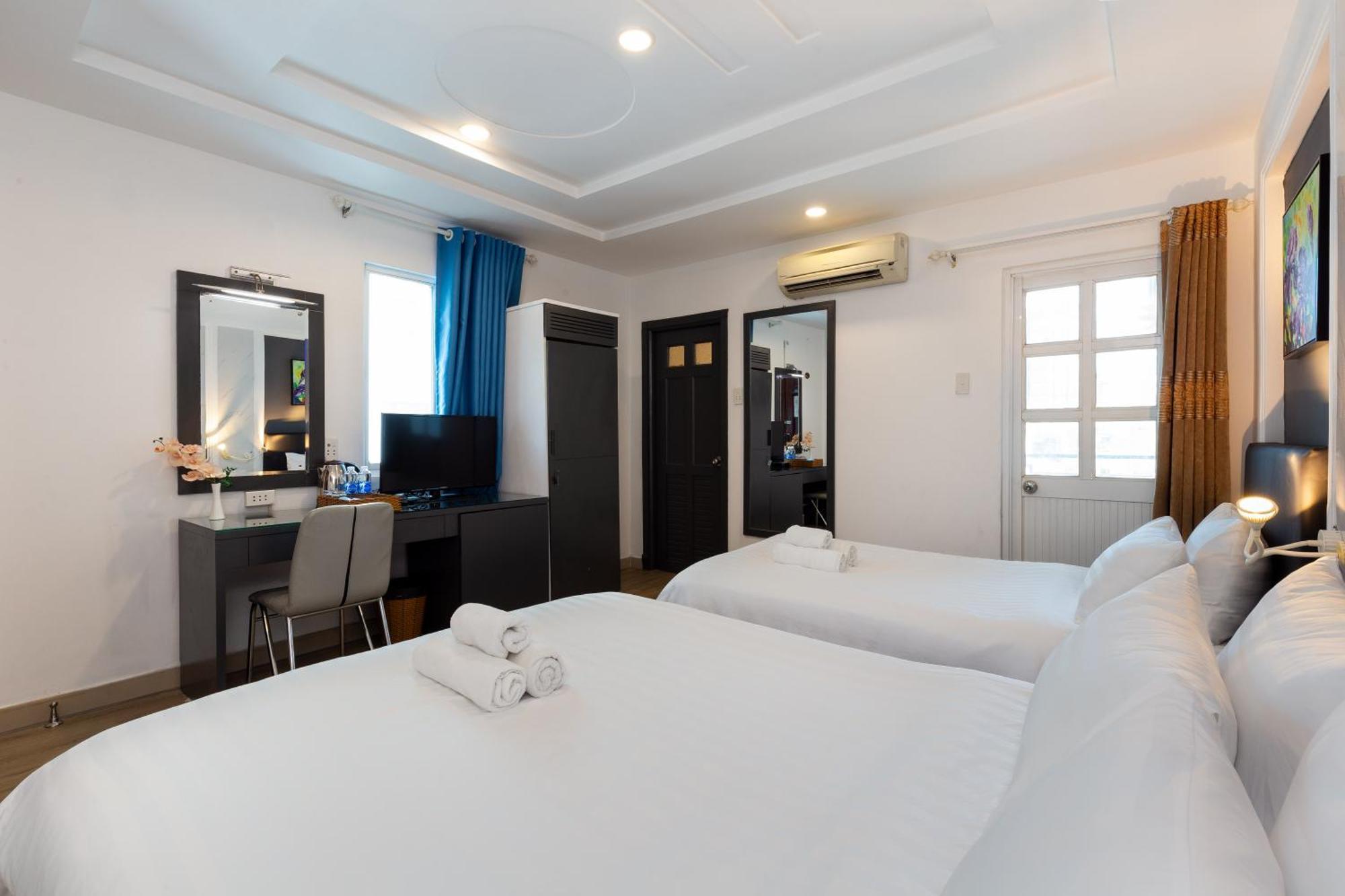 Apec Hotel Хошимин Экстерьер фото